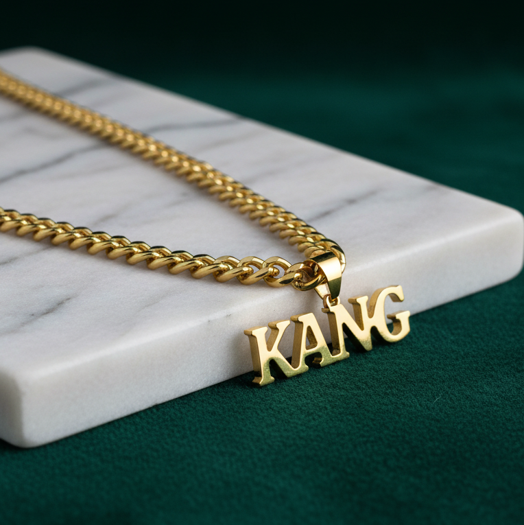 Gold-plated custom name necklace for men on a curb chain, name 'KANG' in English on marble