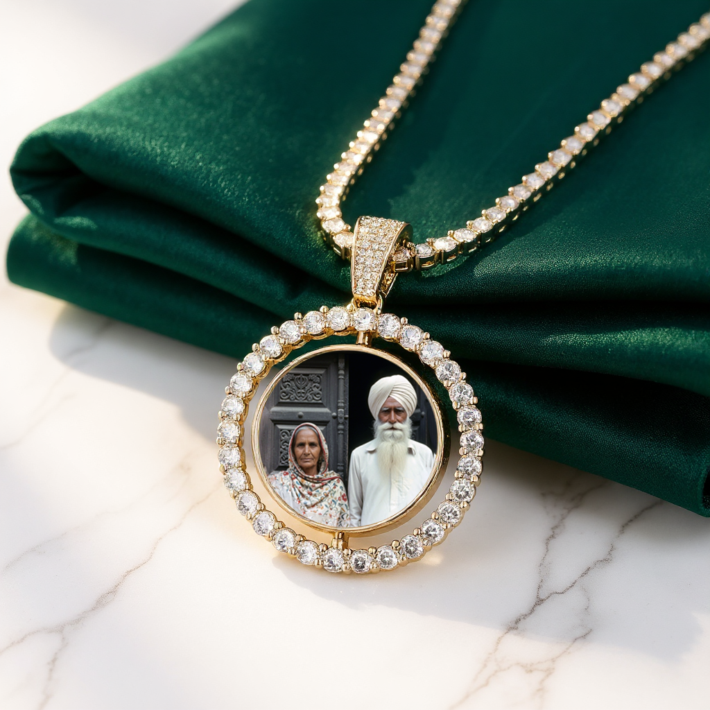 Rotating double-sided photo pendant with sparkling stones, shown with an elderly couple portrait, on green velvet