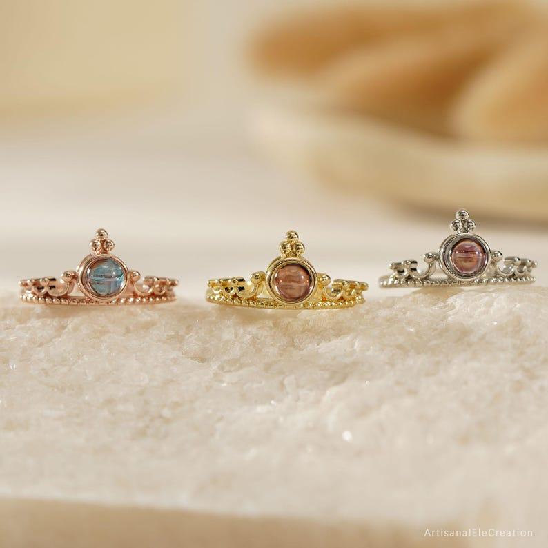 Crown projection ring with a hidden photo in the round stone, gold-tone crown band, three colour options: rose gold, gold and silver tone