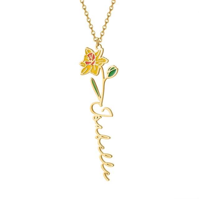 Birth flower name necklace: coloured birth flower with a name below, gold-tone, yellow daffodil with a name, on white